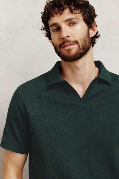 Polo manches courtes col resort mati&egrave;re textur&eacute;e