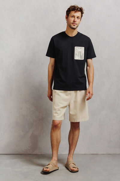 T-shirt met zak, macram&eacute; en strandlook
