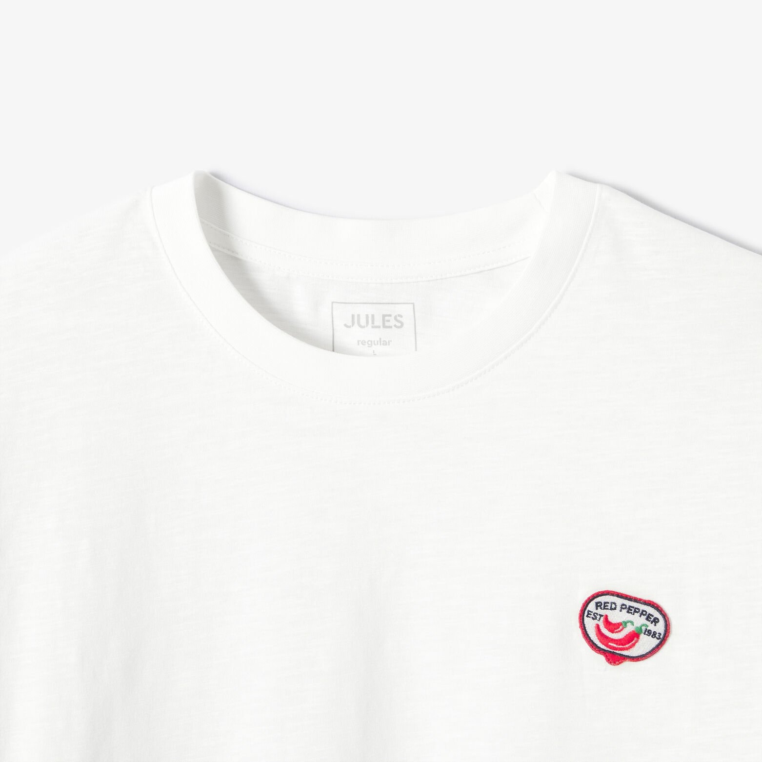 T-shirt in gevlamde stof met borduursel op de bors