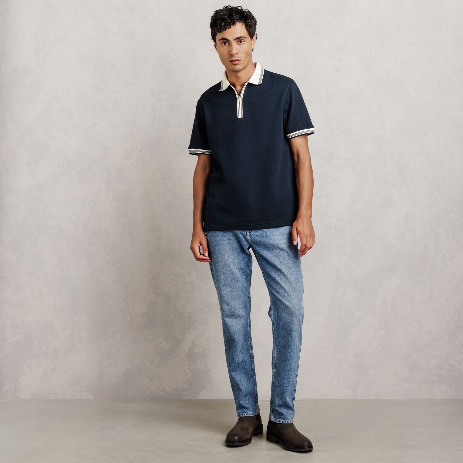 Polo manches courtes col zipp&eacute; gaufr&eacute;