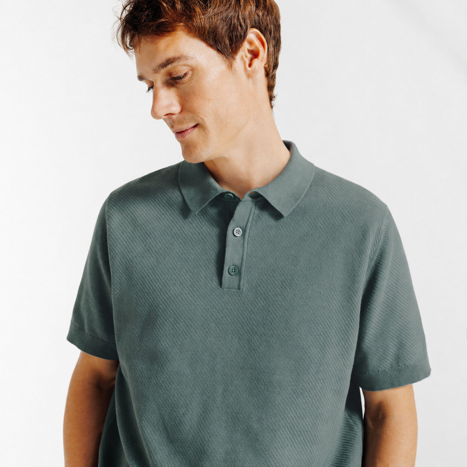 Polo met knoopkraag in tricot met fantasie stekenp