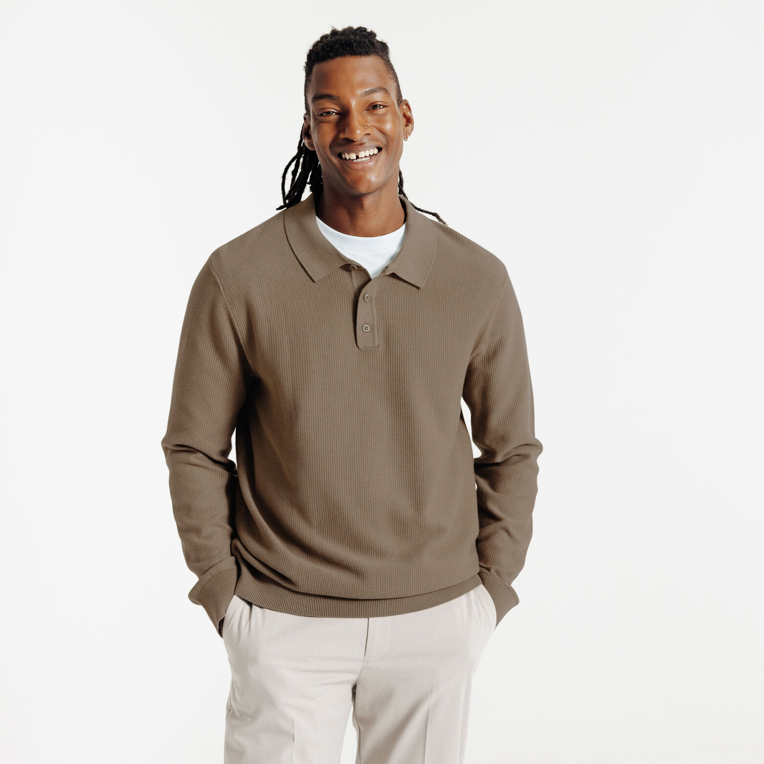 Polo in tricot met fantasie stekenpatroon en knoop