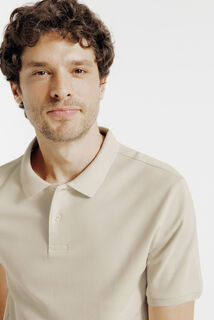 Effen polo in piqu&eacute;katoen met korte mouwen