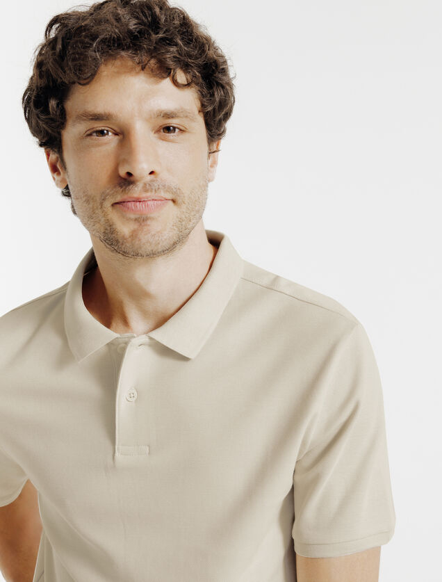 Effen polo in piqu&eacute;katoen met korte mouwen