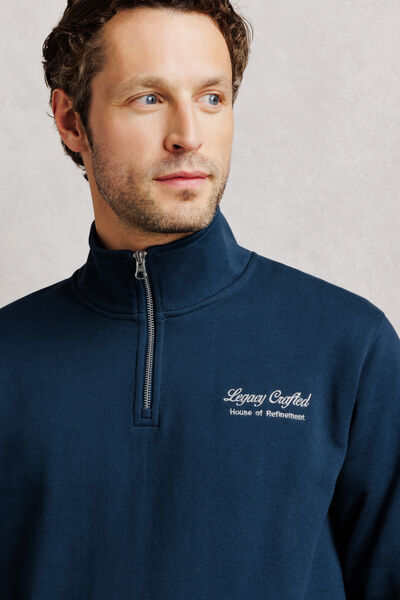 Sweater met ritskraag, geborduurd "Legacy crafted"