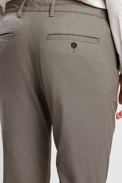 Pantalon chino slim elastiqué reliefé