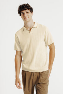 Polo en maille col resort jeux de points fantaisie