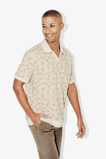 Polo manches courtes imprim&eacute; col resort