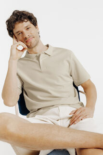 Effen polo in piqu&eacute;katoen met korte mouwen