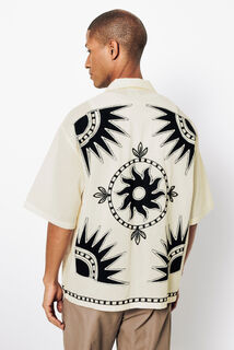 Boxy fit hemdje in geborduurd katoen