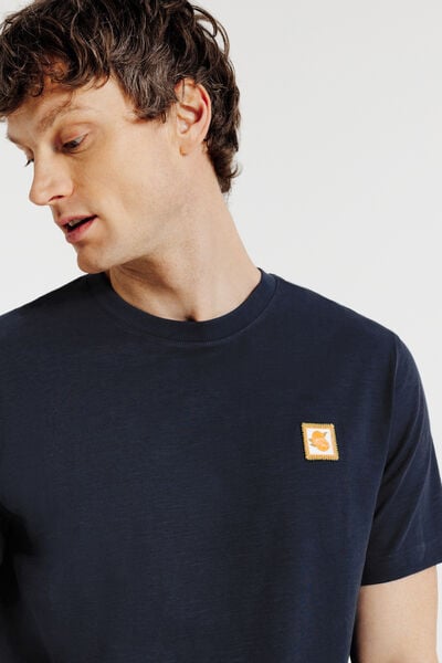 T-shirt in gevlamde stof met borduursel op de bors