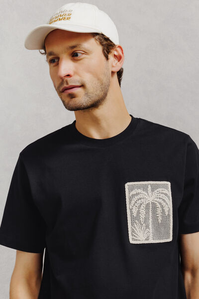 T-shirt met zak, macram&eacute; en strandlook