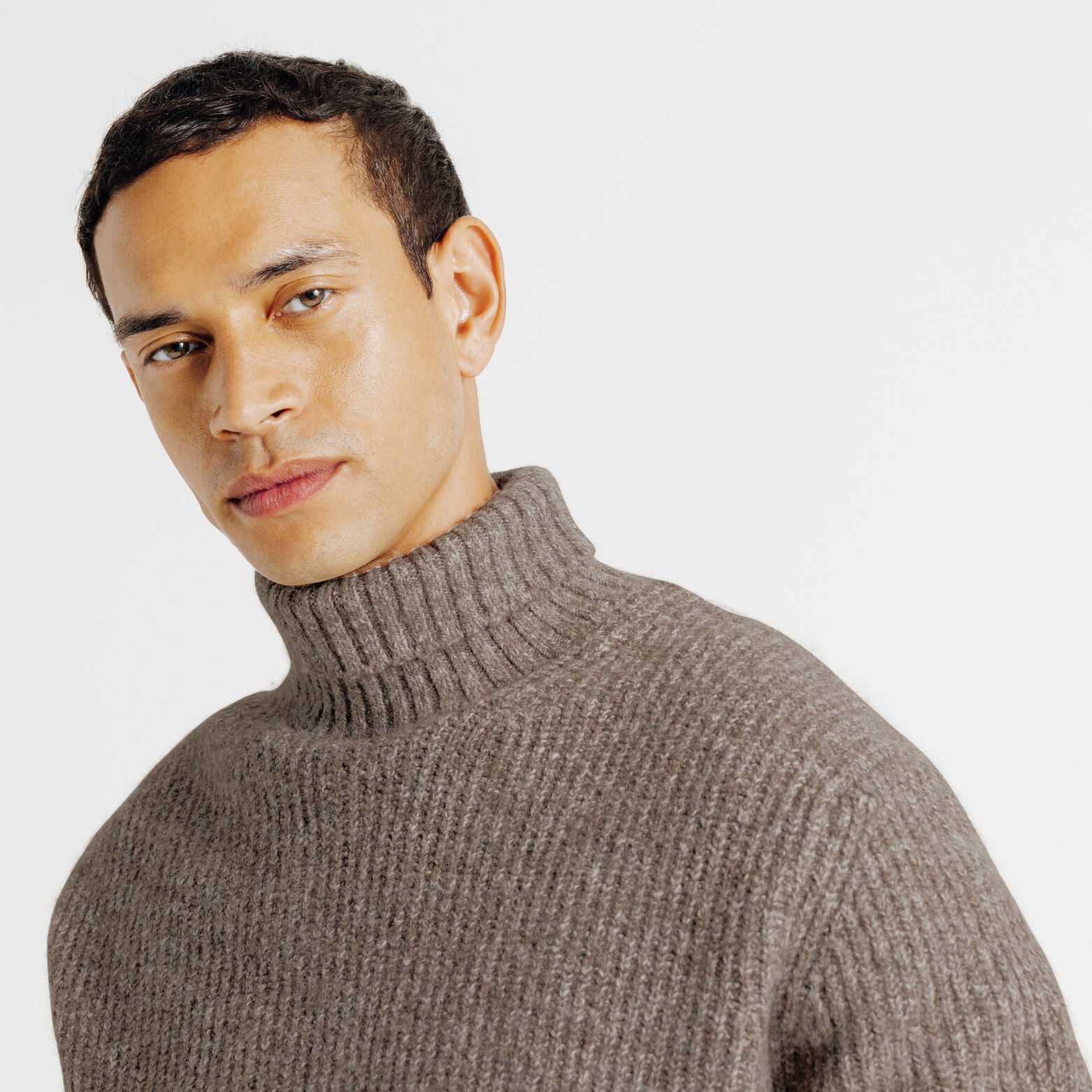 Pull col roulé tweed