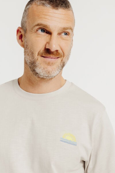 T-shirt in gevlamde stof met borduursel op de bors