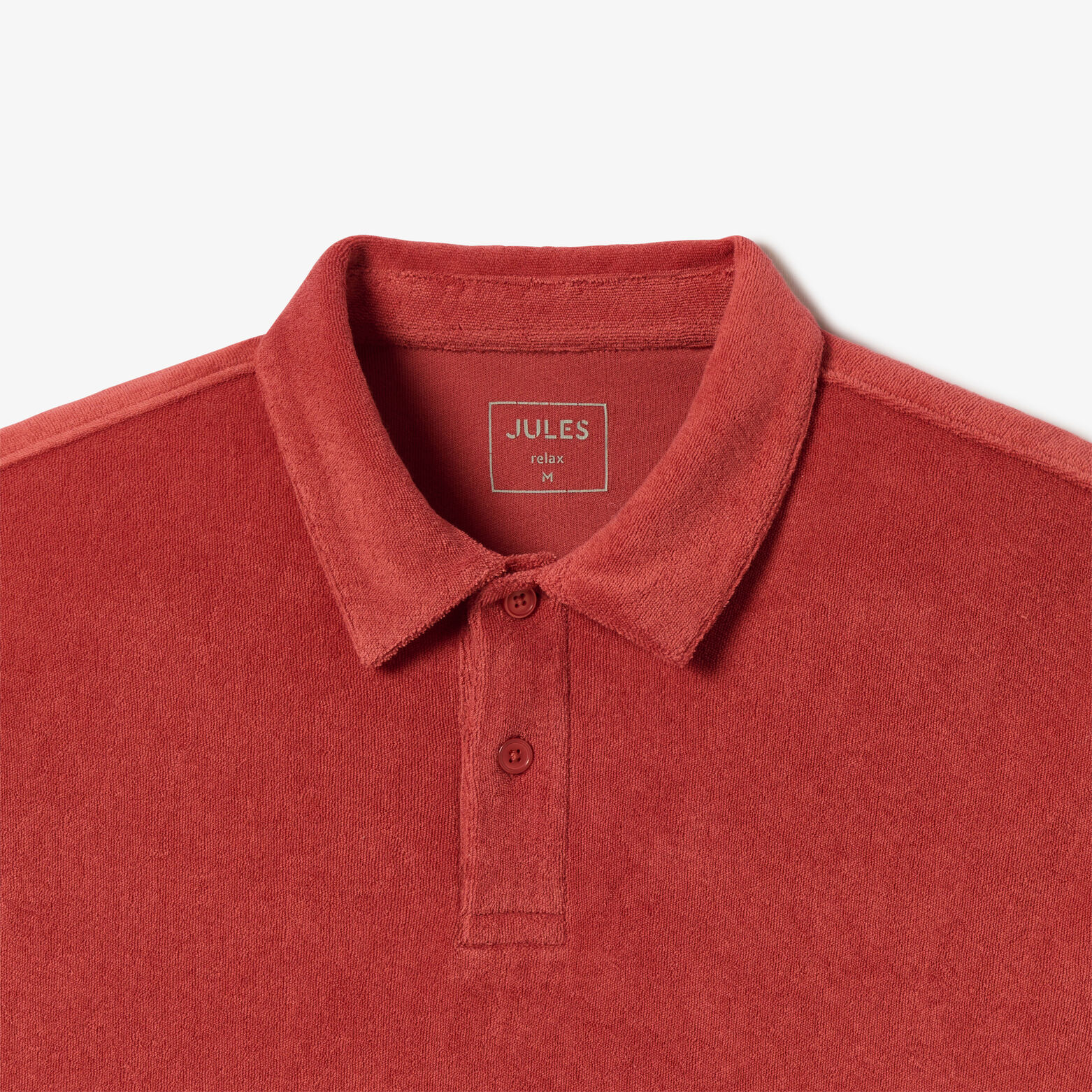 Polo manches courtes uni mati&egrave;re &eacute;ponge