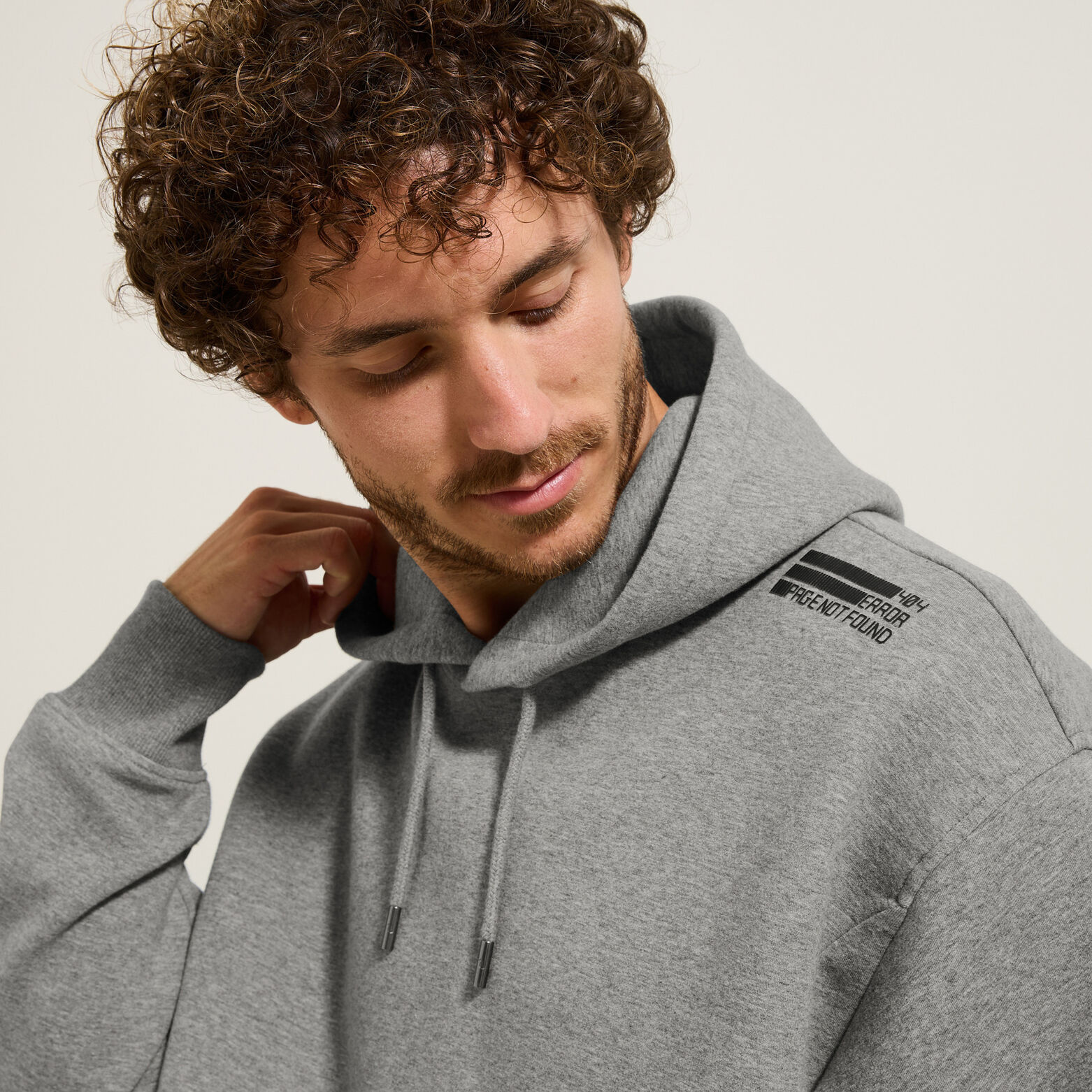 Sweat à capuche oversize bas droit