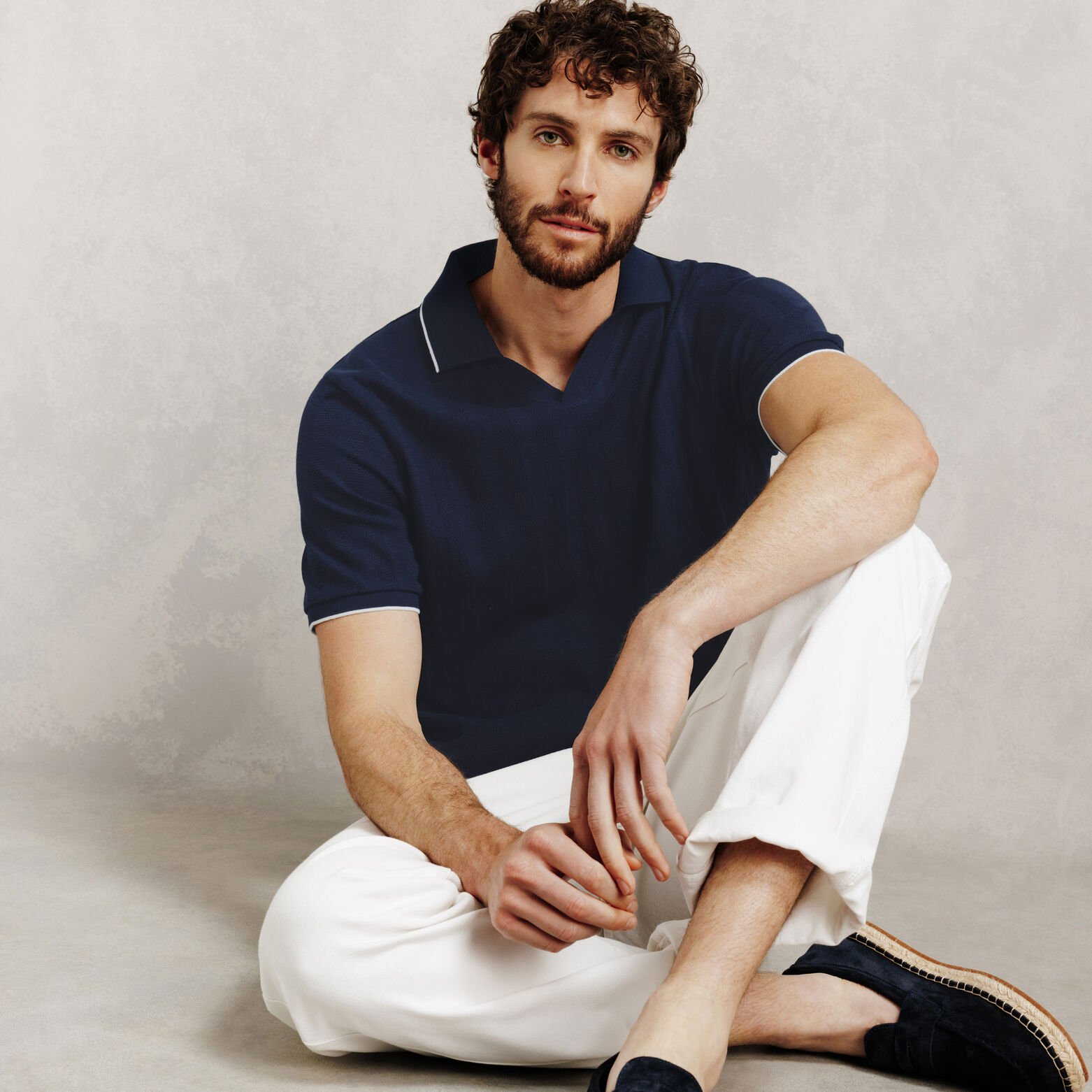 Polo manches courtes col resort textur&eacute;