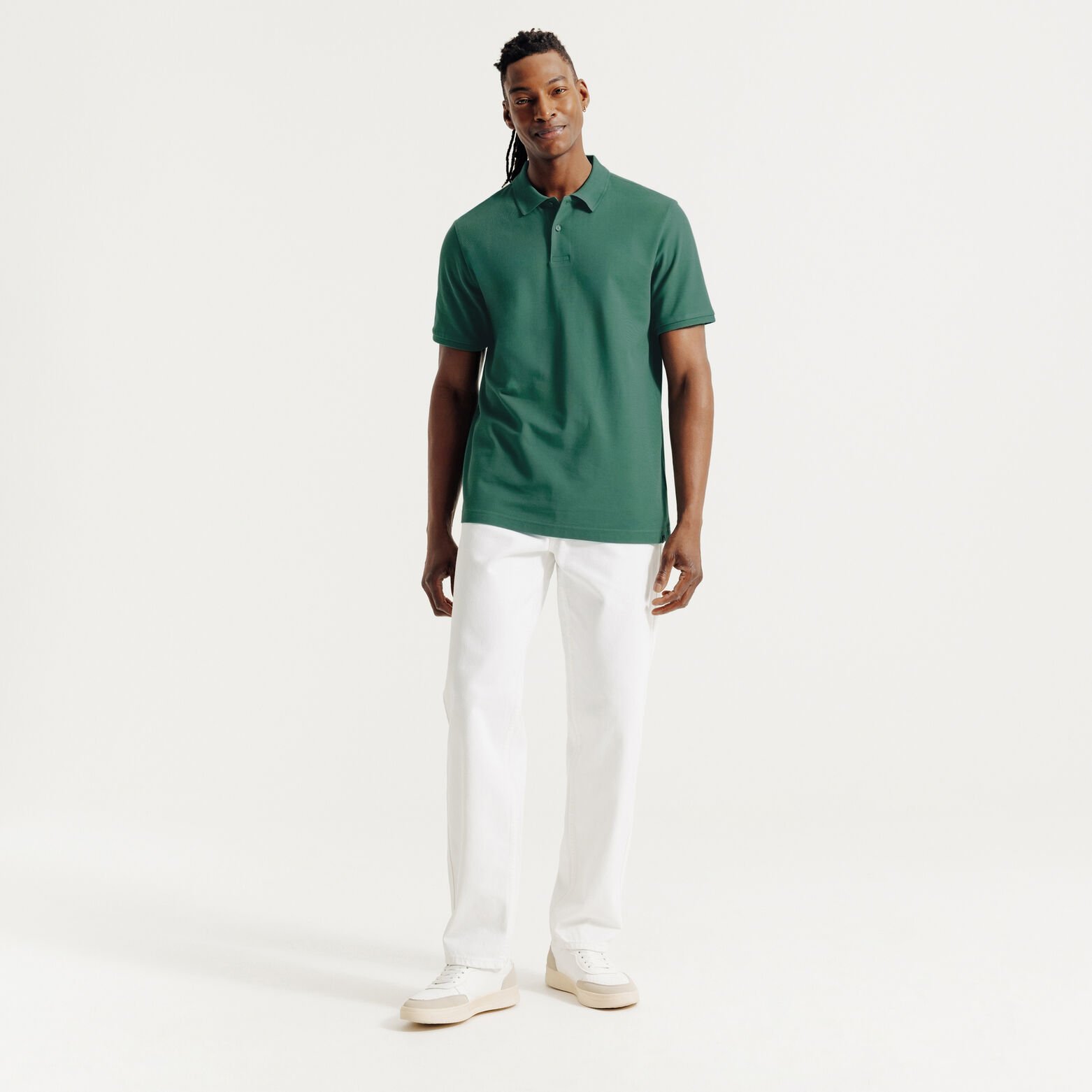 Effen polo in piqu&eacute;katoen met korte mouwen