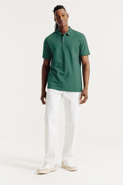 Effen polo in piqu&eacute;katoen met korte mouwen