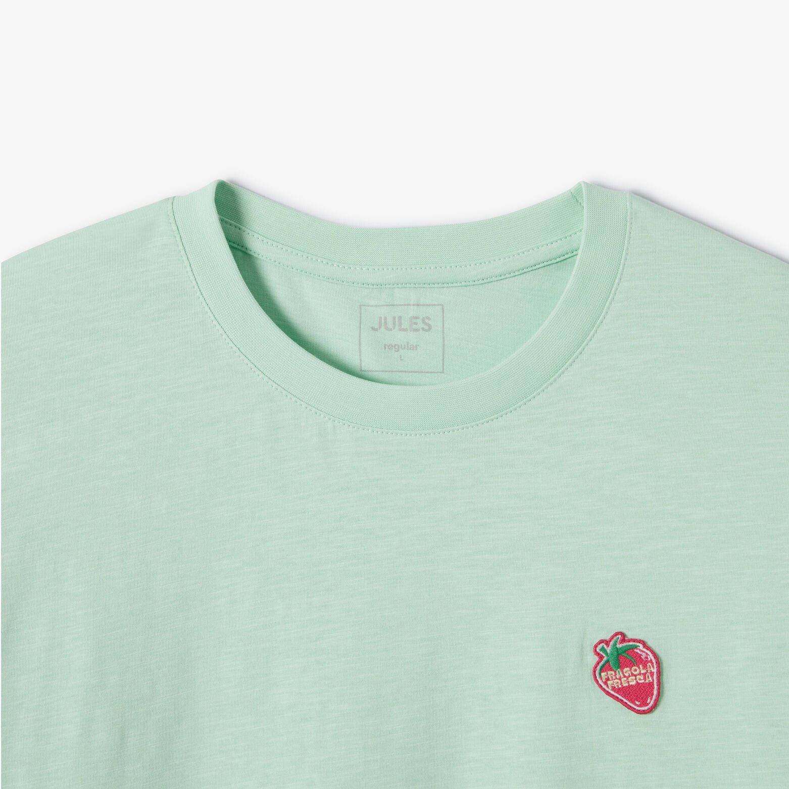 T-shirt in gevlamde stof met borduursel op de bors