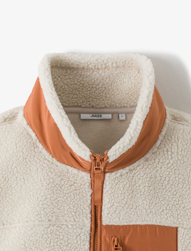 Mouwloos jasje in contrasterende sherpa