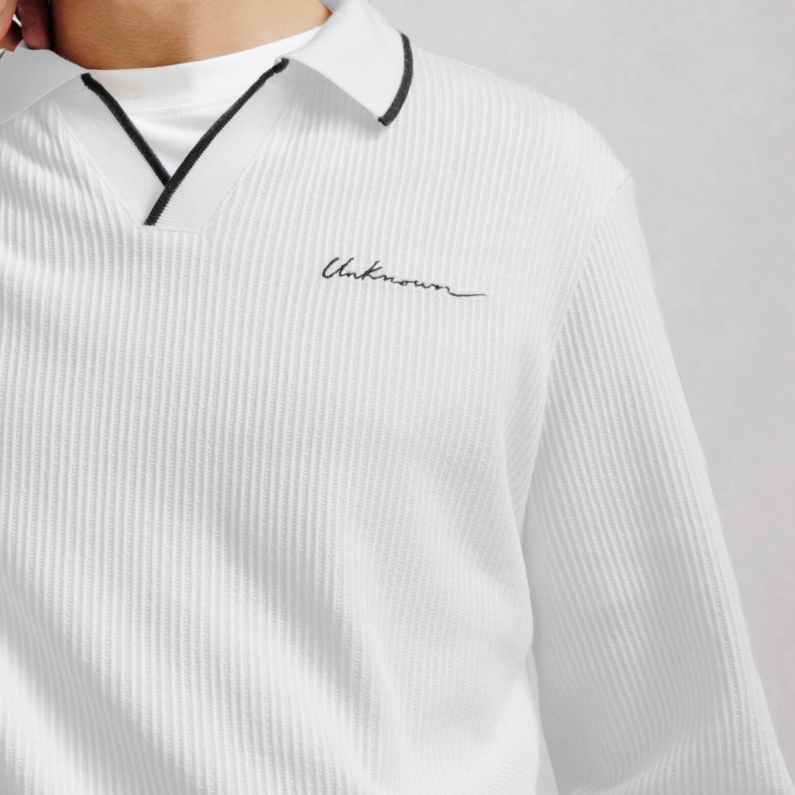 Polo manches longues col resort jacquard contrast&eacute;