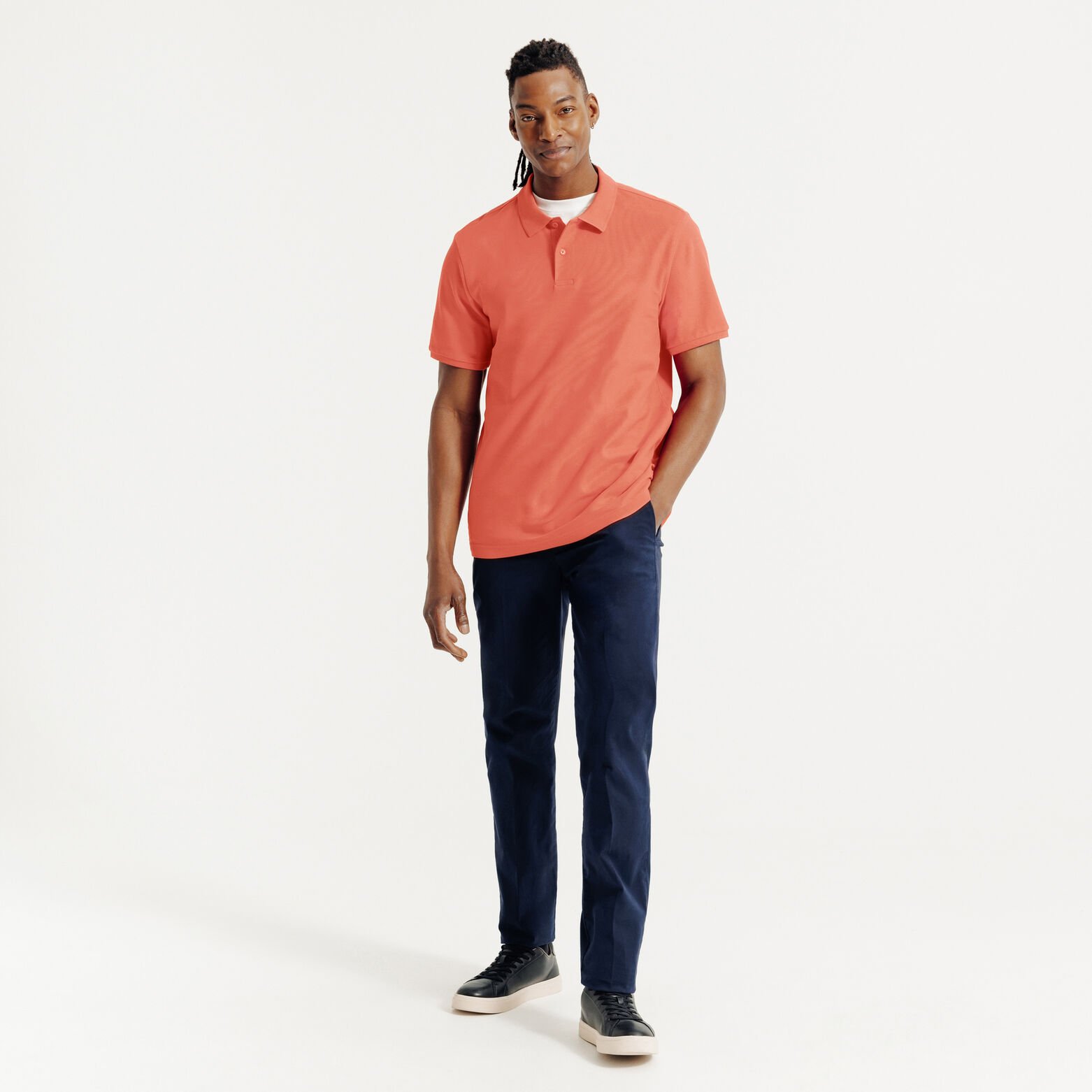 Effen polo in piqu&eacute;katoen met korte mouwen