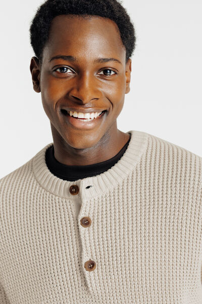 Pull col rond boutonné gaufré