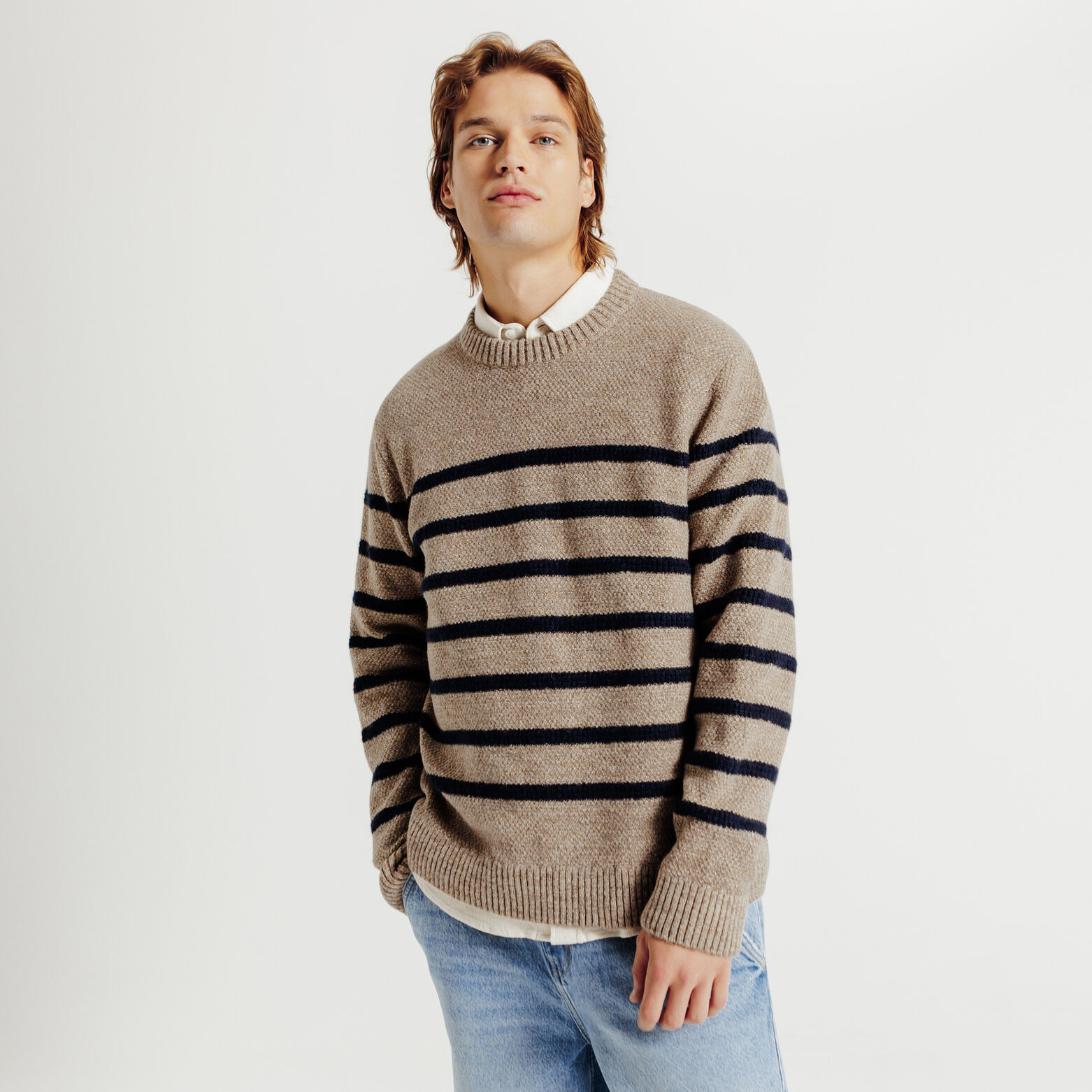 Pull col rond jeux de points rayé