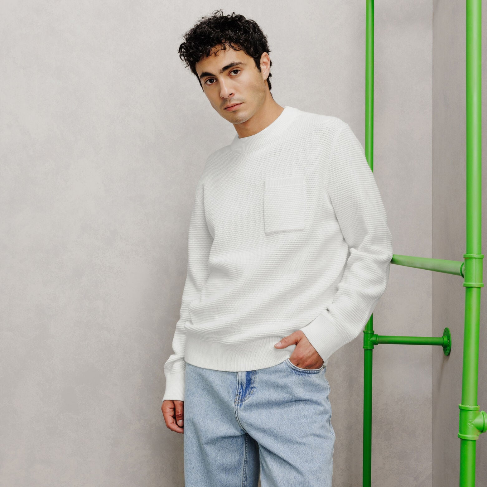 Pull col rond point de riz poche poitrine