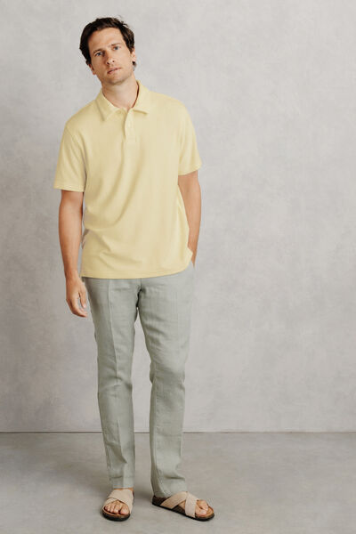 Polo manches courtes uni mati&egrave;re &eacute;ponge