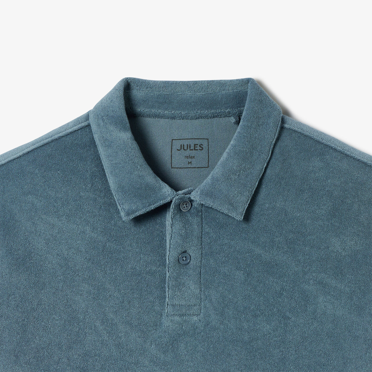 Polo manches courtes uni mati&egrave;re &eacute;ponge