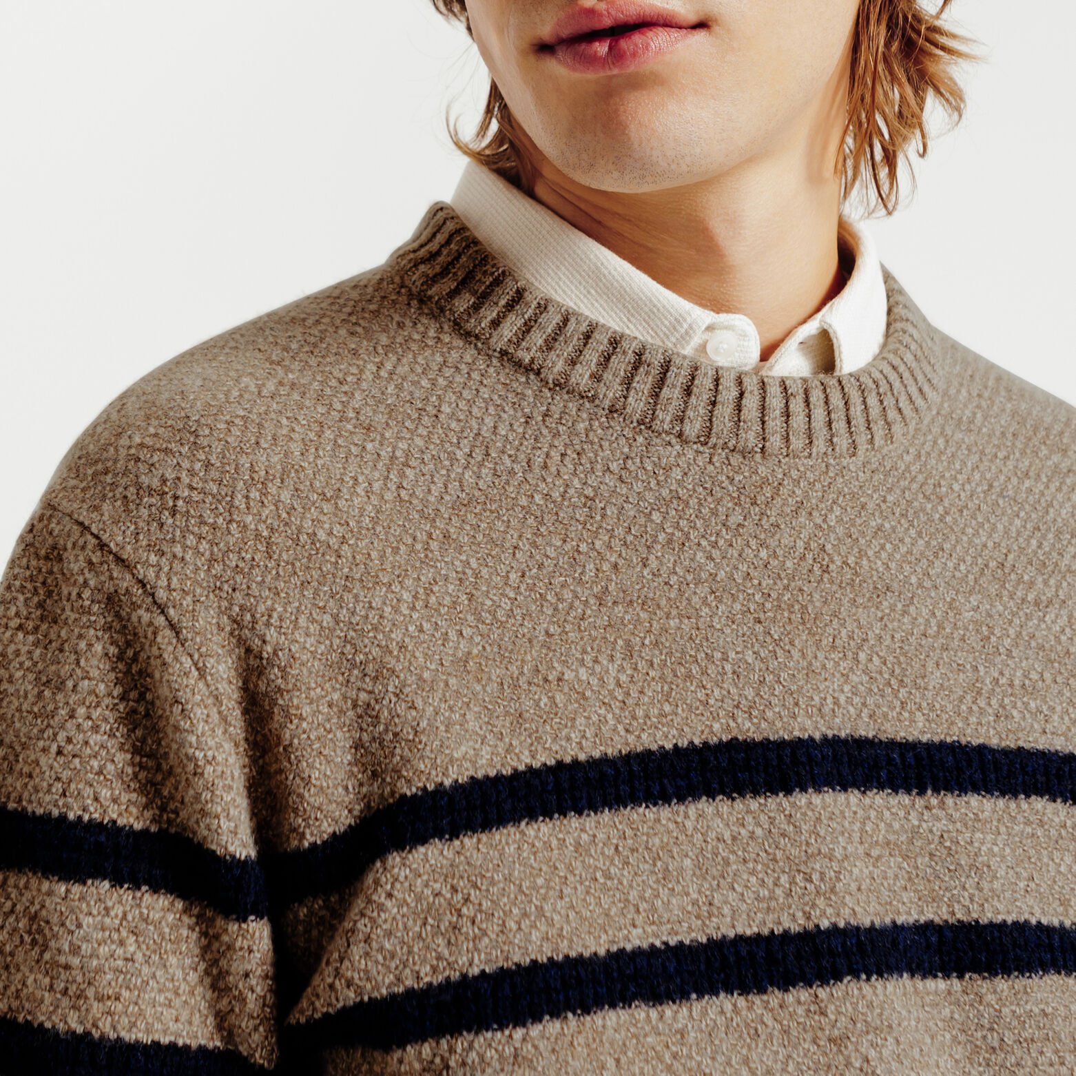 Pull col rond jeux de points rayé