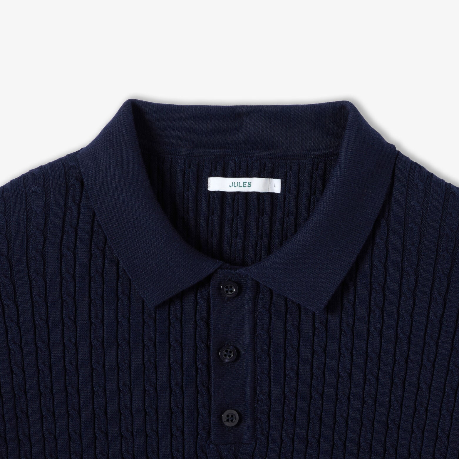 Gebreide polo met korte mouwen en kabelmotief