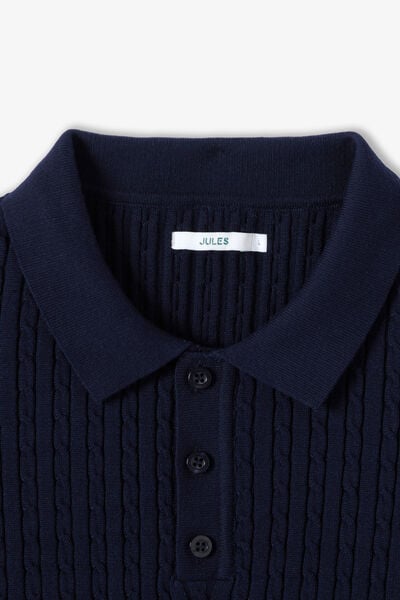 Gebreide polo met korte mouwen en kabelmotief