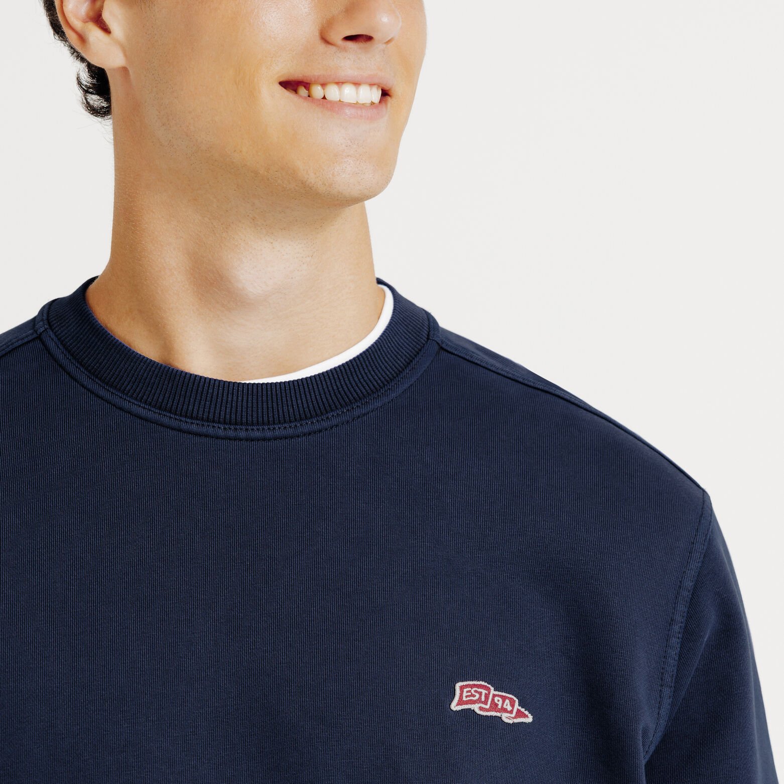 Sweat col rond effet délavé patch