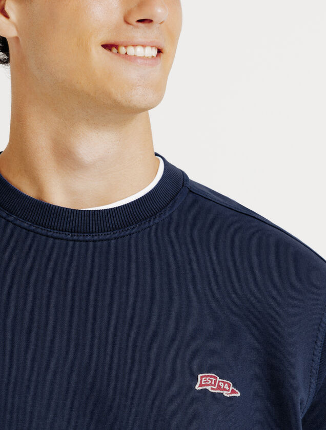 Sweat col rond effet d&eacute;lav&eacute; patch
