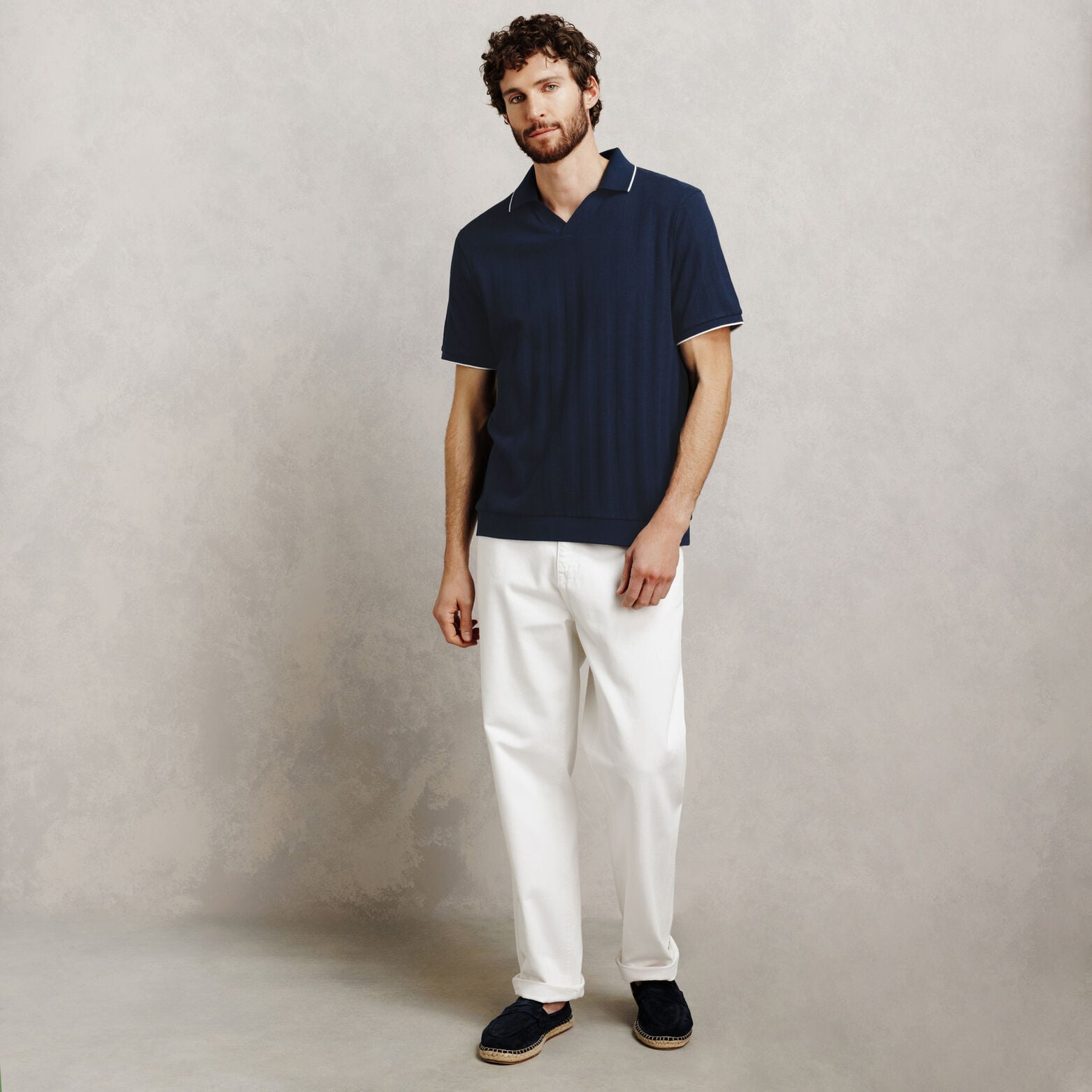 Polo manches courtes col resort textur&eacute;