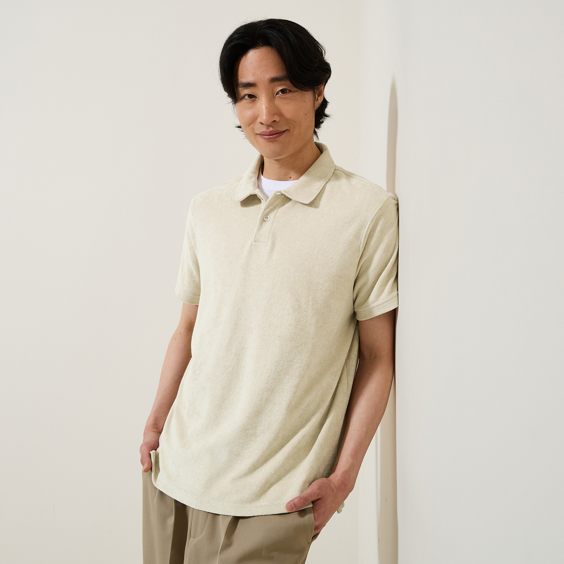 Polo manches courtes relax uni matière éponge Beige S 60% Coton, 40% Polyester Homme